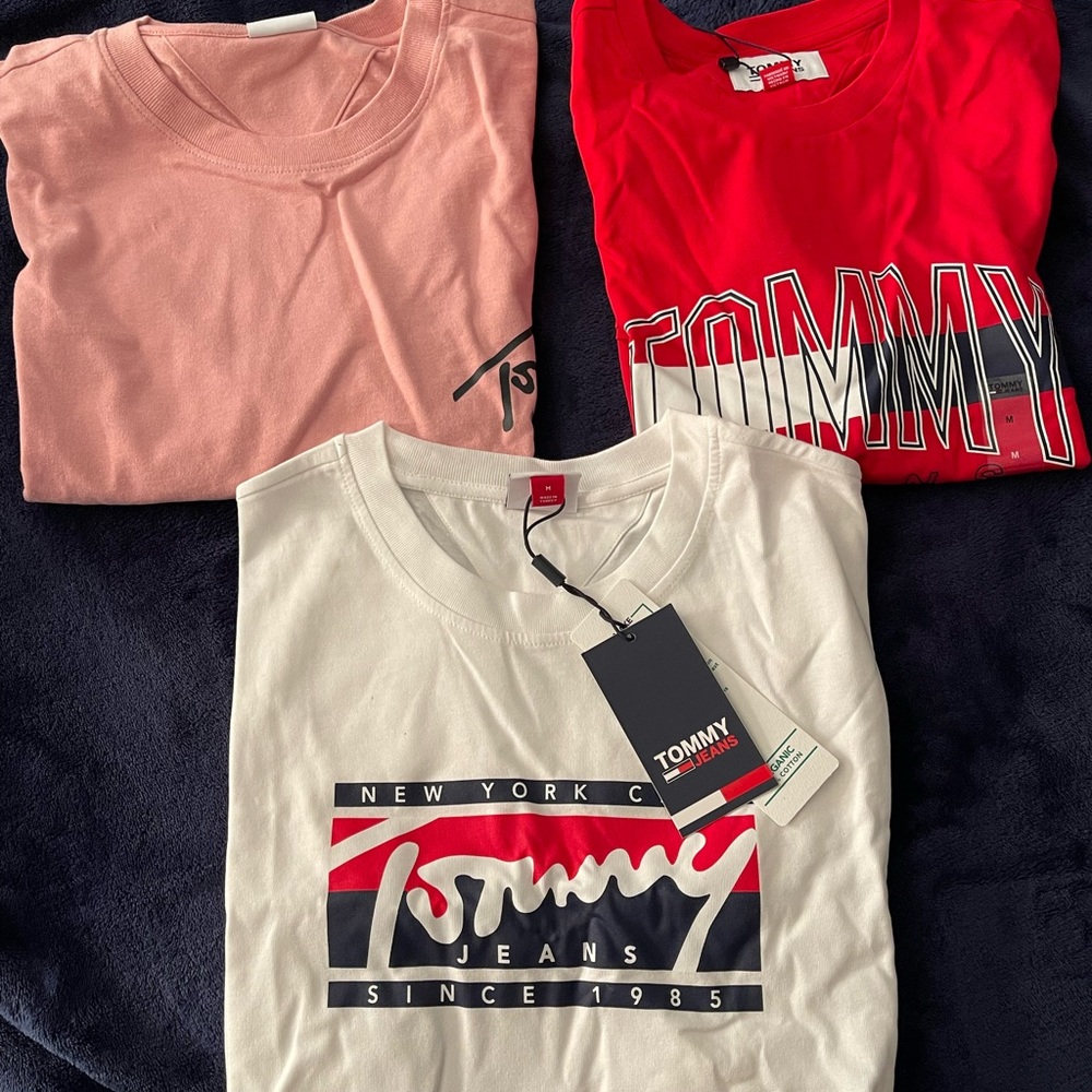 band new never worn tommy shirts